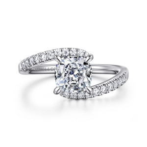 Gabriel & Co. ER16320C6W44JJ 14 karat white gold Contemporary engagement ring, front view of a cushion cut center with band ends sweeping past on opposite sides