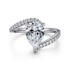 Gabriel & Co. ER16320P8W44JJ 14 karat white gold Contemporary engagement ring, front view of a pear shaped center with diamond set band ends sweeping past on each side