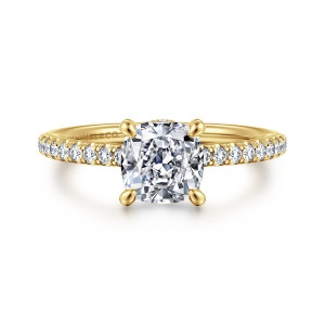 Gabriel & Co. ER16321C6Y44JJ 14 karat yellow gold Classic engagement ring, front view of a cushion cut center in four claws with a sliver of stones behind it