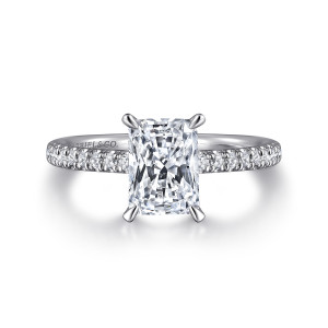 Gabriel & Co. ER16321N6W44JJ 14 karat white gold Classic engagement ring, front view of the rectangular seat with rounded prong tips and a row of diamonds on each shoulder