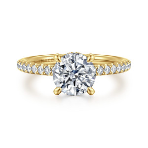 Gabriel & Co. ER16321R6Y44JJ 14 karat yellow gold Classic engagement ring, front view of a round center with rounded prongs and diamonds along both shoulders of the band