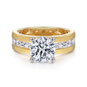 Gabriel & Co. ER16335R8M43JJ 14 karat white and yellow gold Contemporary engagement ring, front view of a round center above a wide channel of baguette stones
