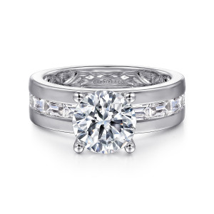 Gabriel & Co. ER16335R8W43JJ 14 karat white gold Contemporary engagement ring, front view of a round center over a wide band with a channel of baguettes