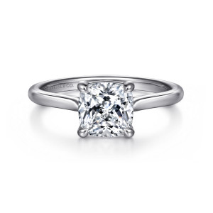 Gabriel & Co. ER16336C8W4JJJ 14 karat white gold Contemporary engagement ring, front view of the cushion center in claw prongs above a plain band that narrows toward the head