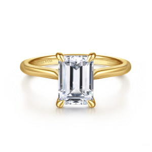 Gabriel & Co. ER16336E8Y4JJJ 14 karat yellow gold Contemporary engagement ring, front view of an emerald cut center held by four claws with shoulders sweeping up to the head