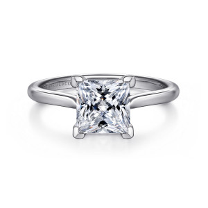 Gabriel & Co. ER16336S8W4JJJ 14 karat white gold Contemporary engagement ring, front view of a square princess cut center gripped at each corner by a flat faced prong