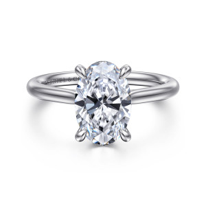Gabriel & Co. ER16337O8W44JJ 14 karat white gold Contemporary engagement ring, front view of an oval center on teardrop shaped prongs above a smooth plain band