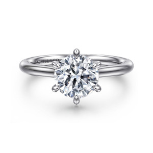 Gabriel & Co. ER16337R6W44JJ 14 karat white gold Contemporary engagement ring, front view of a round center held by six teardrop tipped prongs on a slim rounded band