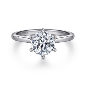 Gabriel & Co. ER16337R8W44JJ 14 karat white gold Contemporary engagement ring, front view of a round center held by six evenly spaced prongs above a smooth band
