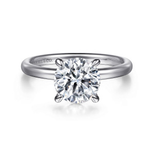 Gabriel & Co. ER16338R8W4JJJ 14 karat white gold Classic engagement ring, front view of a round center in four rounded tip prongs above a plain rounded band