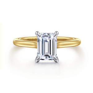 Gabriel & Co. ER16339E6M44JJ 14 karat white and yellow gold Classic engagement ring, front view of an emerald cut center in corner claws over a smooth curved band