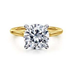 Gabriel & Co. ER16339R12M44JJ 14 karat white and yellow gold Classic engagement ring, front view of a round center with rounded prongs in the cooler tone against a smooth warm band
