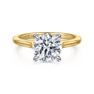 Gabriel & Co. ER16339R8M44JJ 14 karat white and yellow gold Classic engagement ring, front view of a round center in four claws above gently rising shoulders and a smooth band