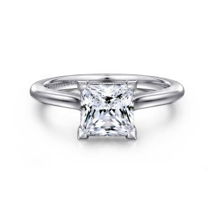 Gabriel & Co. ER16339S6W44JJ 14 karat white gold Classic engagement ring, front view of a princess cut center gripped at its corners by angular prongs over a smooth band