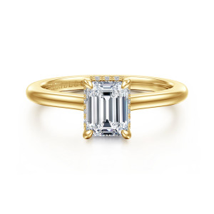 Gabriel & Co. ER16340E4Y44JJ 14 karat yellow gold Classic engagement ring, front view of an emerald cut center with four corner prongs and a slim band