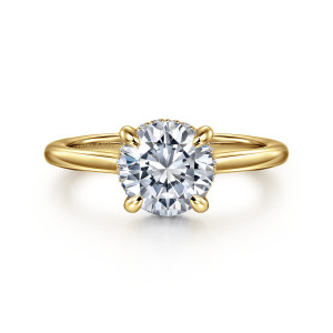 Gabriel & Co. ER16340R6Y44JJ 14 karat yellow gold Classic engagement ring, front view of a round center on teardrop tipped prongs with tiny stones barely showing behind it