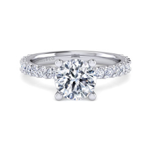 Gabriel & Co. ER16348R8W44JJ 14 karat white gold Classic engagement ring, front view of the round center in ball tipped prongs with diamonds along each shoulder