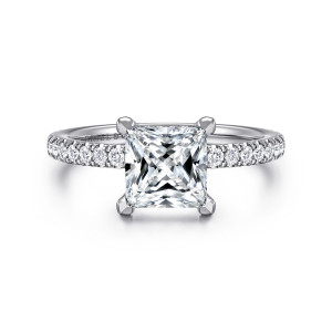 Gabriel & Co. ER16349S6W44JJ 14 karat white gold Classic engagement ring, front view of a princess cut center gripped at each corner above a band of small diamonds