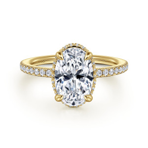 Gabriel & Co. ER16350O8Y44JJ 14 karat yellow gold Contemporary engagement ring, front view of an oval center with four claw prongs and tiny stones peeking at the rim