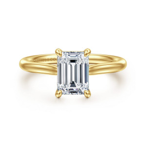 Gabriel & Co. ER16355E6Y4JJJ 14 karat yellow gold Contemporary engagement ring, front view of an emerald cut center in four teardrop tipped prongs with a slim band behind