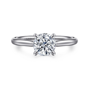 Gabriel & Co. ER16355R4W4JJJ 14 karat white gold Contemporary engagement ring, front view of a round center in four tapered prongs on a slim plain band