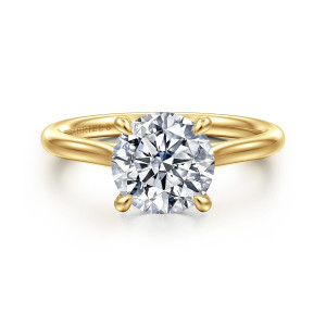 Gabriel & Co. ER16355R8Y4JJJ 14 karat yellow gold Contemporary engagement ring, front view of the round center with teardrop tipped claws on a smooth tapering band
