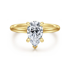 Gabriel & Co. ER16356P6Y44JJ 14 karat yellow gold Classic engagement ring, front view of a pear shaped center with leaf tipped prongs and a pointed cap prong
