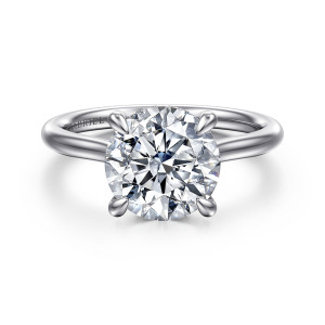 Gabriel & Co. ER16356R12W44JJ 14 karat white gold Classic engagement ring, front view of the round center held by teardrop shaped prongs on a smooth tapered band