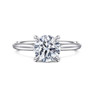 Gabriel & Co. ER16356R6W44JJ 14 karat white gold Classic engagement ring, front view of a round center held by four tapered prongs on a slim polished band
