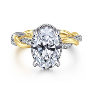 Gabriel & Co. ER16357O12M44JJ 14 karat white and yellow gold Contemporary engagement ring, front view of an oval center in four prongs with the twisting band winding off both sides