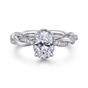 Gabriel & Co. ER16357O4W44JJ 14 karat white gold Contemporary engagement ring, front view of an oval center with a beaded rim around the seat between twisting stone set strands