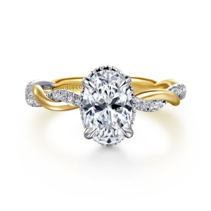 Gabriel & Co. ER16357O6M44JJ 14 karat white and yellow gold Contemporary engagement ring, front view of an oval center inside a beaded rim with the plain and stone set strands crossing