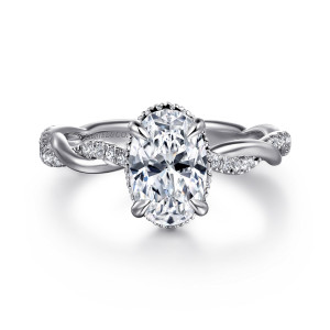 Gabriel & Co. ER16357O6W44JJ 14 karat white gold Contemporary engagement ring, front view of the oval center in claws with a beaded rim showing and twisted strands beside it