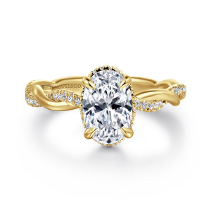 Gabriel & Co. ER16357O6Y44JJ 14 karat yellow gold Contemporary engagement ring, front view of an oval center with tiny stones peeking from a beaded rim above the band