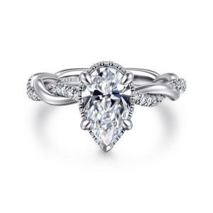 Gabriel & Co. ER16357P6W44JJ 14 karat white gold Contemporary engagement ring, front view of a pear shaped center with a pointed tip and diamond edge peeking around the stone
