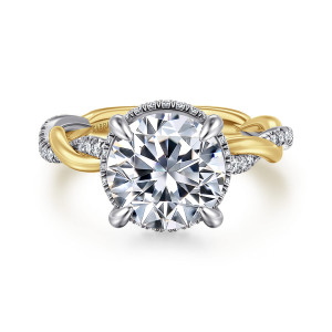 Gabriel & Co. ER16357R12M44JJ 14 karat white and yellow gold Contemporary engagement ring, front view of a round center in four prongs with halo stones peeking out around its edge