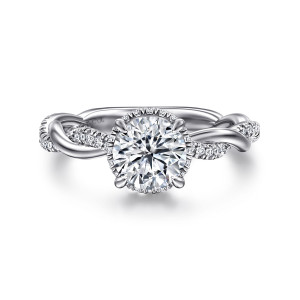 Gabriel & Co. ER16357R4W44JJ 14 karat white gold Contemporary engagement ring, front view of a round center with a thin edge of stones peeking out and twisting strands