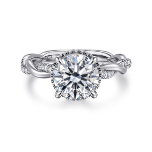 Gabriel & Co. ER16357R8W44JJ 14 karat white gold Contemporary engagement ring, front view of a round center in rounded claws with small diamonds peeking out beneath it