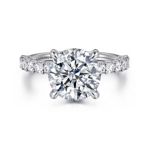 Gabriel & Co. ER16372R12W44JJ 14 karat white gold Contemporary engagement ring, front view of a round center with round diamonds in shared prongs along both shoulders