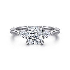 Gabriel & Co. ER16402C6W44JJ 14 karat white gold Lotus engagement ring, front view of a cushion cut center between pear shaped side stones pointing toward the band
