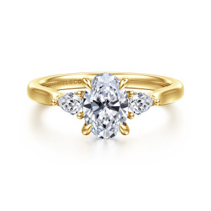 Gabriel & Co. ER16402O4Y44JJ 14 karat yellow gold Lotus engagement ring, front view of an oval center held by slim prongs between two pear shaped side diamonds