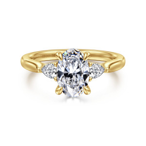 Gabriel & Co. ER16402O6Y44JJ 14 karat yellow gold Lotus engagement ring, front view of an oval center flanked by pear shaped side stones with points turned outward