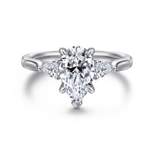 Gabriel & Co. ER16402P6W44JJ 14 karat white gold Lotus engagement ring, front view of a pear shaped center between smaller pear shaped stones pointing outward