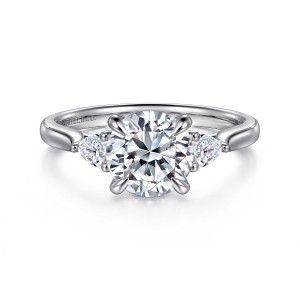 Gabriel & Co. ER16402R6W44JJ 14 karat white gold Lotus engagement ring, front view of a round center between pear shaped side stones with points turned outward