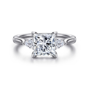 Gabriel & Co. ER16402S6W44JJ 14 karat white gold Lotus engagement ring, front view of a square center between two elongated side stones on slim shoulders