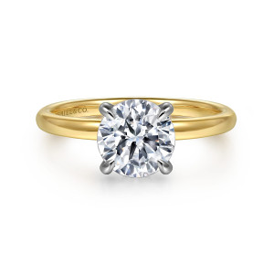Gabriel & Co. ER16403R6M4JJJ 14 karat white and yellow gold Bujukan engagement ring, front view of a round center held by four rounded tip prongs on a slim smooth band