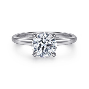 Gabriel & Co. ER16403R6W4JJJ 14 karat white gold Bujukan engagement ring, front view of a round center in four claw prongs on a plain rounded band