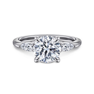 Gabriel & Co. ER16405R8W43JJ 14 karat white gold Classic engagement ring, front view of a round center between two pointed side stones on a plain band