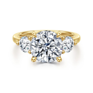 Gabriel & Co. ER16413R12Y44JJ 14 karat yellow gold Classic engagement ring, front view of a round center between round side stones held by small teardrop tipped prongs