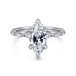 Gabriel & Co. ER16414M6W44JJ 14 karat white gold Contemporary engagement ring, front view of a marquise center held at its pointed tips with lengthwise stones along the slim band